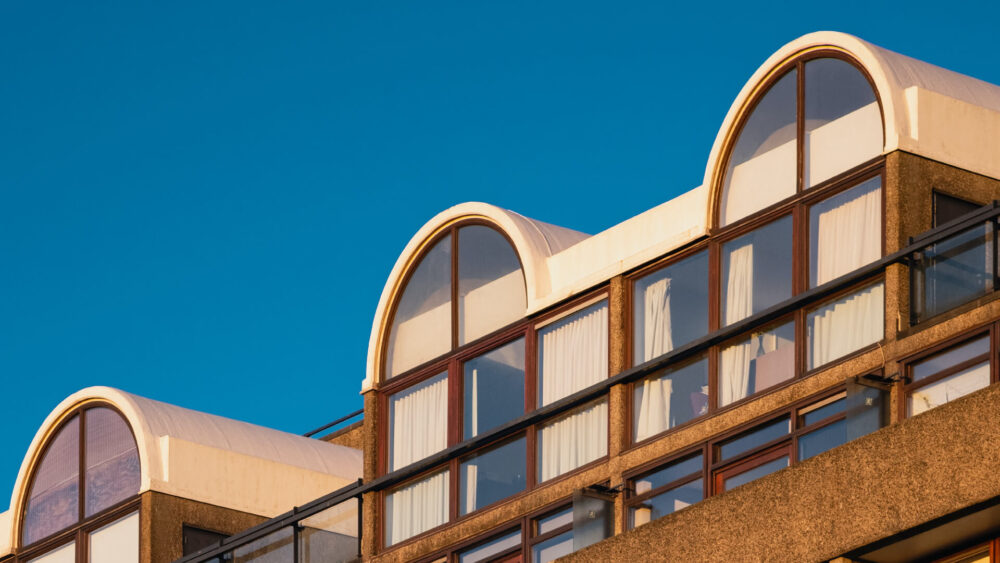 8 best Instagrammable places in London - Barbican - close up of roof top flats, with arching windows