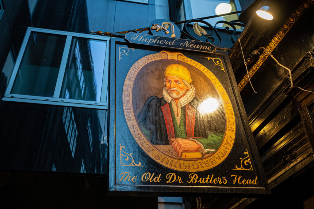 9 Best Pubs in the City of London - The sign of the Old Doctor Butler’s Head pictures a portrait of a man in an oval frame in the style of early modern painters
