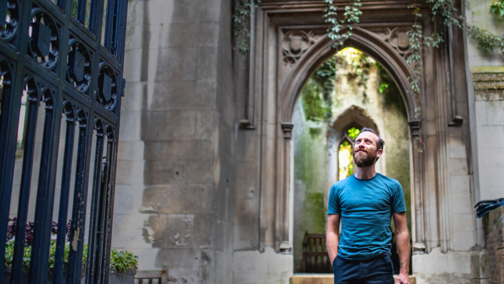 St Dunstan in the East Church Garden - man stood amongst the ruins