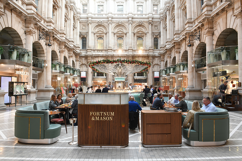 Afternoon Tea Spots in the City of London - Fortnum’s Bar at The Royal Exchange - grand covered courtyard with soft seating and decorative bar