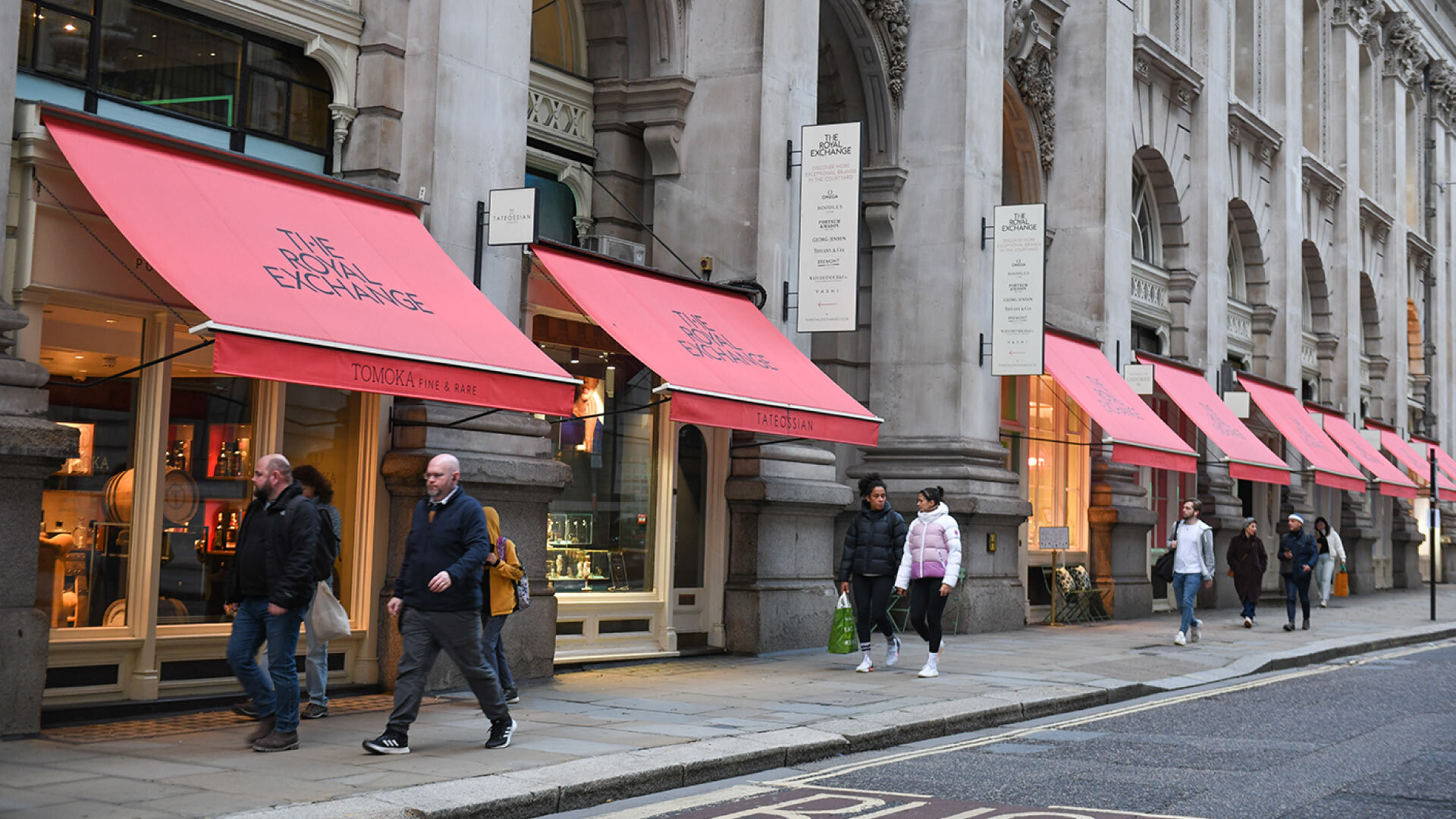 Luxury shopping in the City - The Royal Exchange - view of the shops along the street 