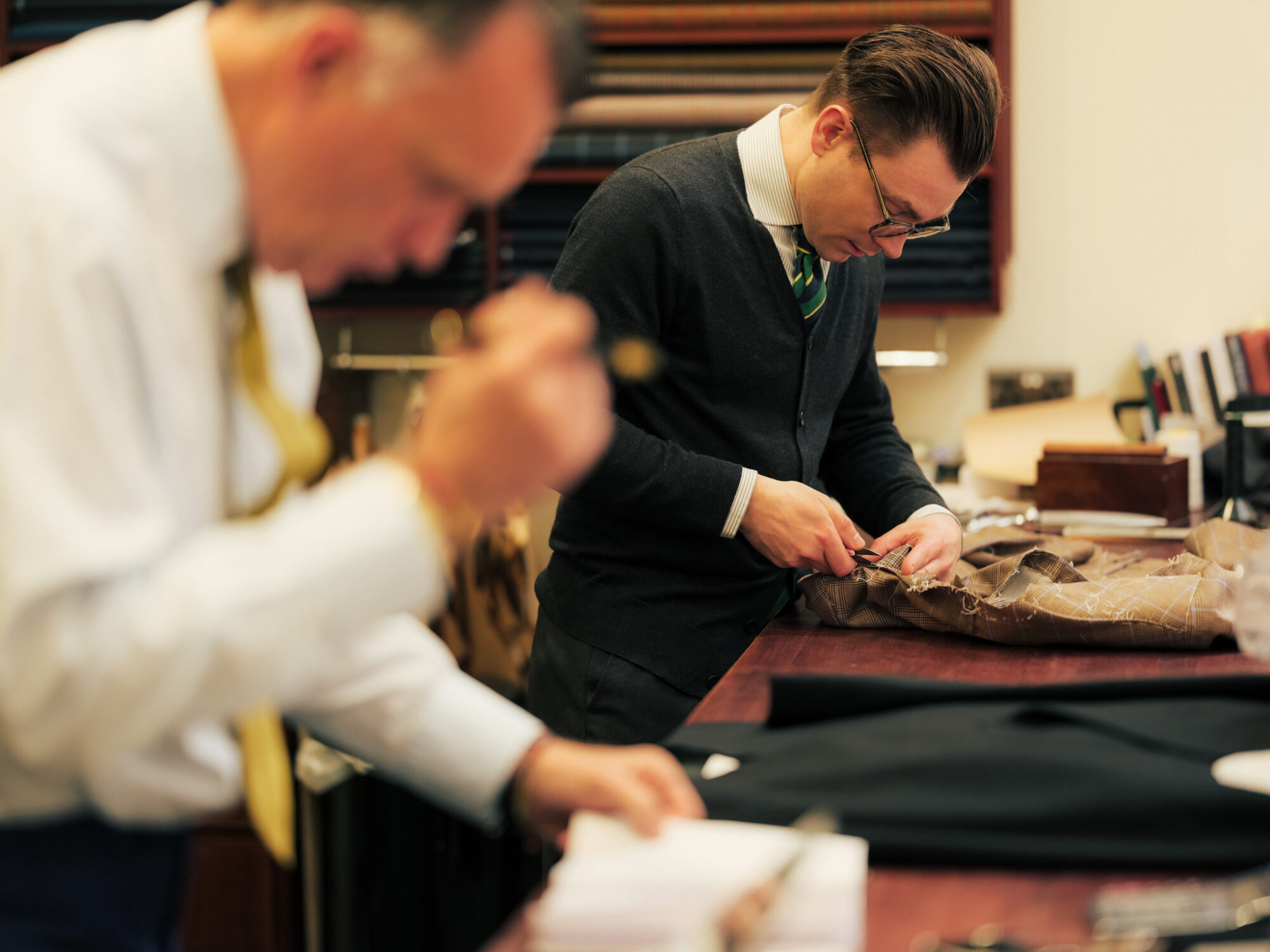 Things to do in the City of London - two tailors at work on suits
