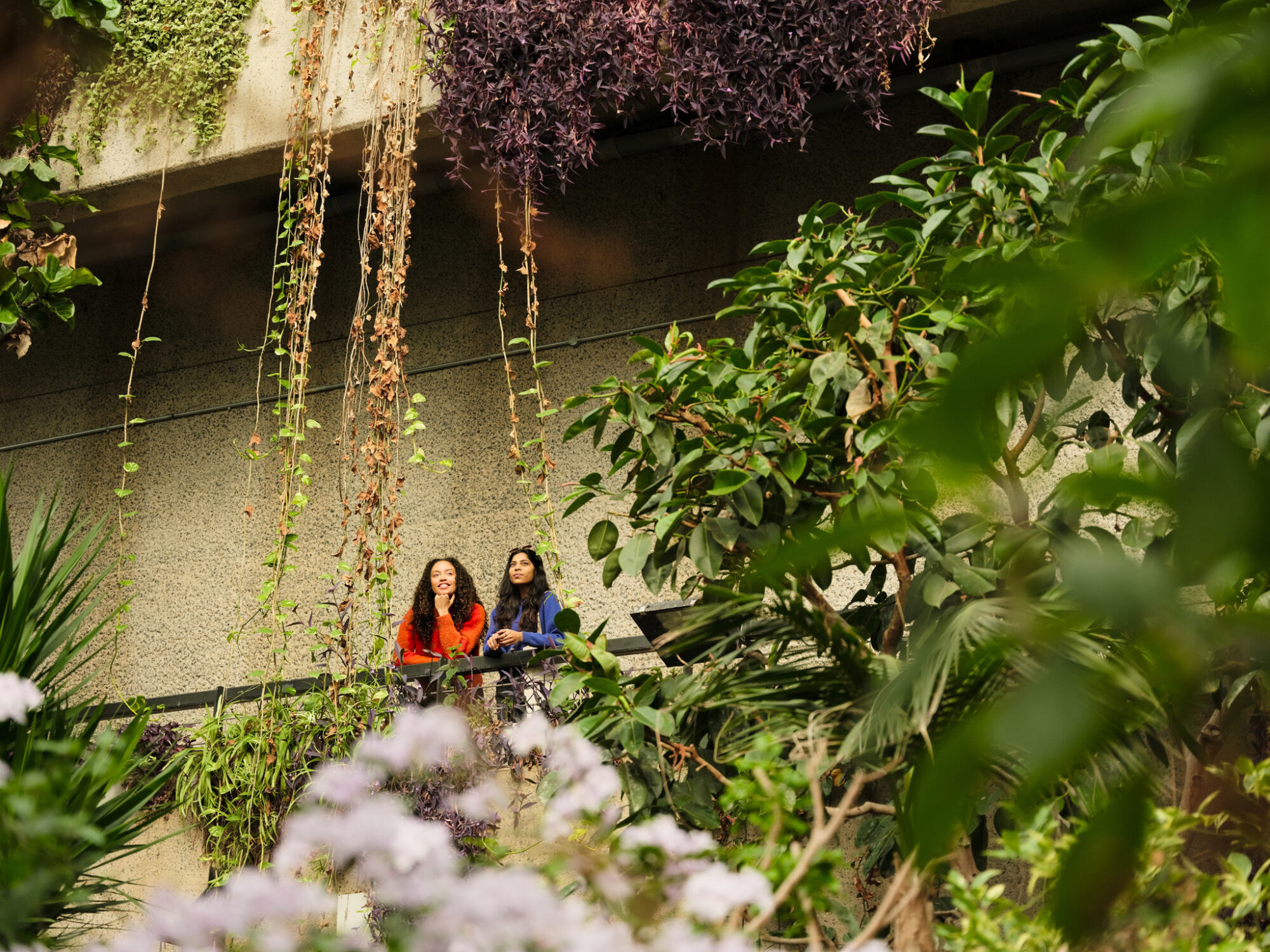 What to do in the City of London - two friends on balcony in the Barbican Conservatory