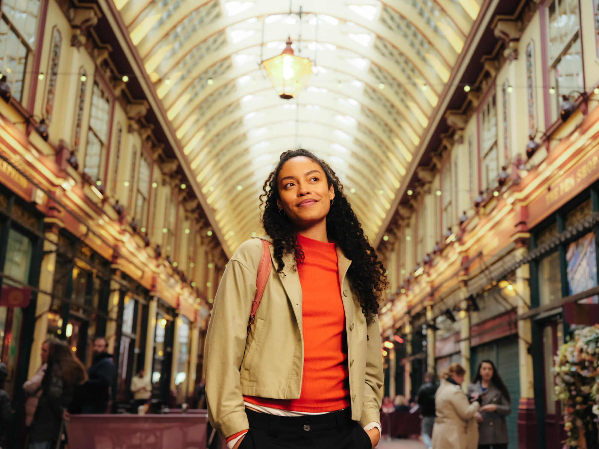 Shopping in City of London - Leadenhall Market - woman walking along makret