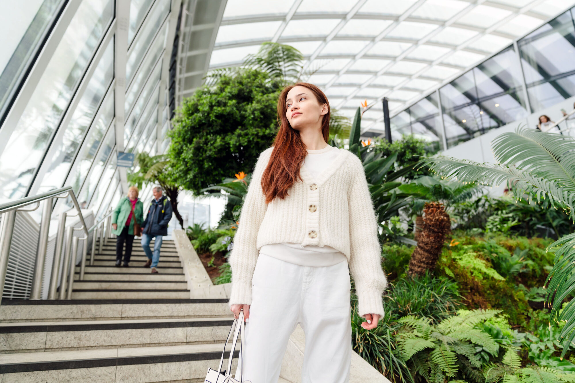 What to do in the City of London - Sky garden - young woman wearing white tropical plants in background