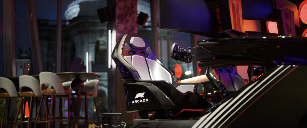 F1 Arcade - an empty gaming seat made to look like a racing car in a low-light hall