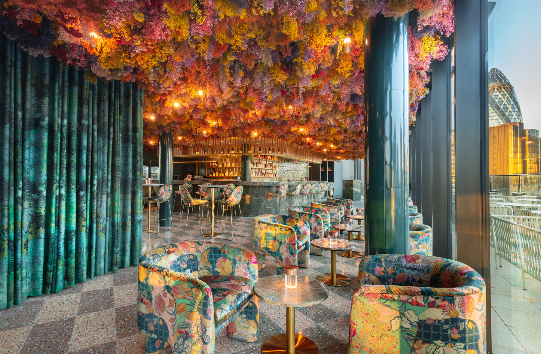 Food and Drink - Florattica - rooftop restaurant interior colourful seating and feature wall