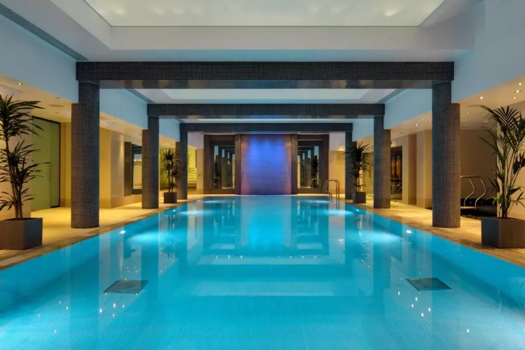 5 best Spas in the City of London - Leonardo Royal Hotel London St Pauls - view of long blue indoor pool