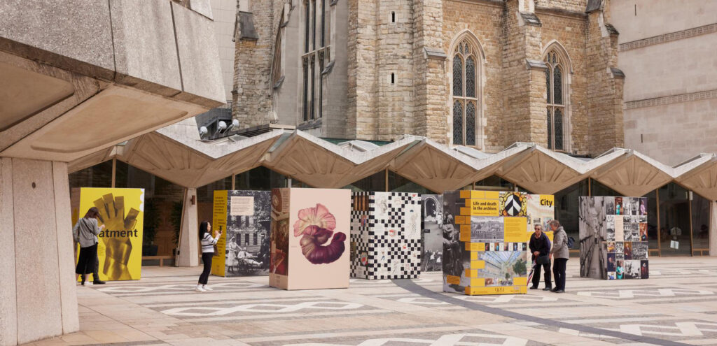 Art in the City of London - Guildhall Yard - display boards with images and text stand in the courtyard