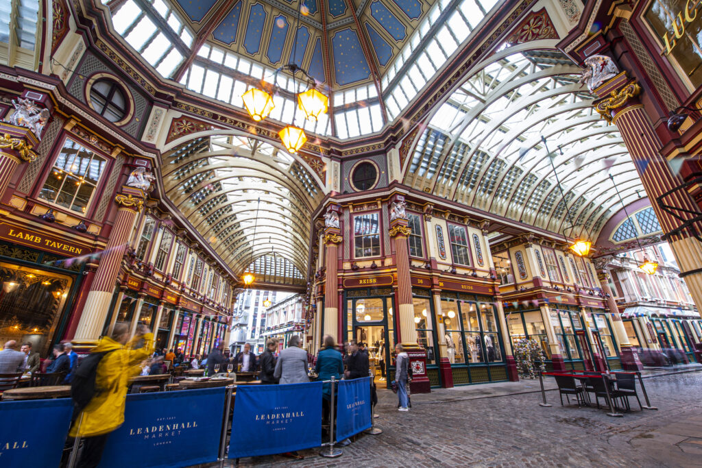Luxury shopping in the City - Leadenhall Market - view of the centre of the market - high glass roof and streets in shot