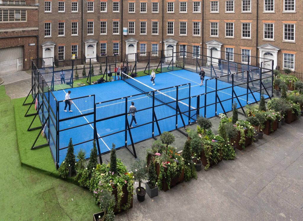 Padel Tennis Festival - blue padel tennis court in the middle of a Georgian crescent