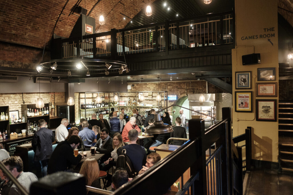 The Banker - interior of pub - brick arching roof