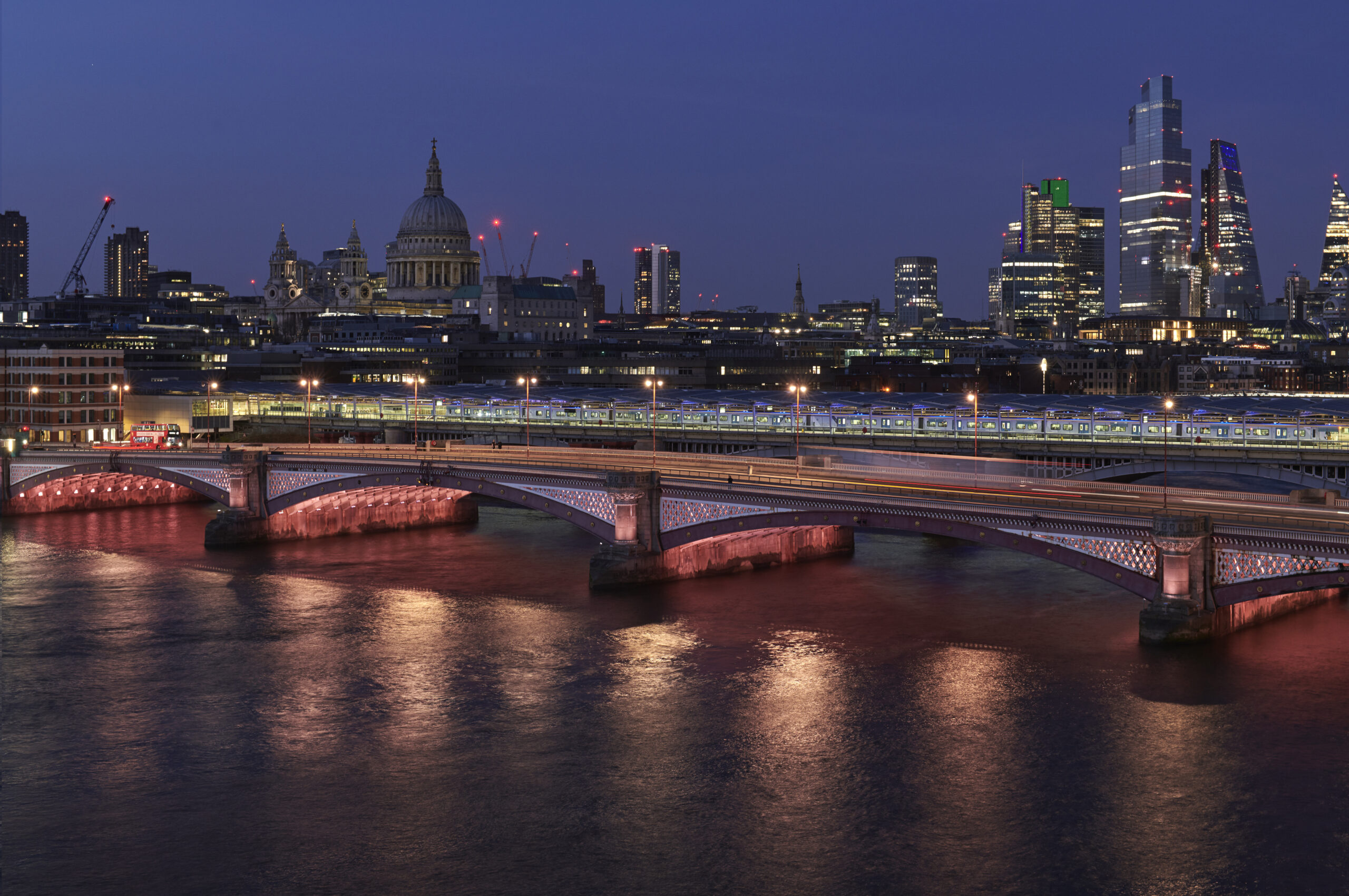 A view of Blackfriars Bridge at night time, during an Illuminated River walk.
