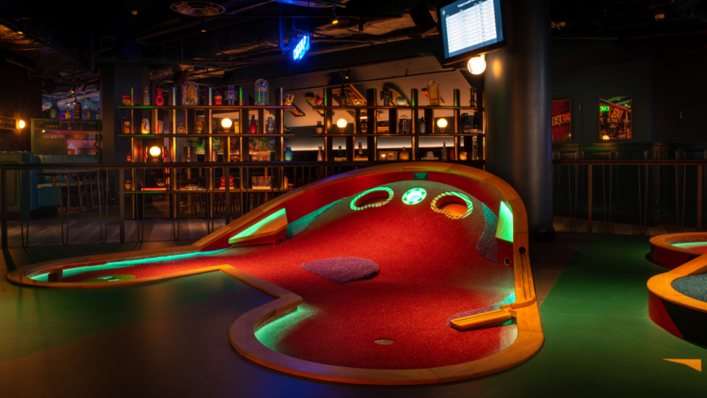 Colourful indoor crazy golf hole