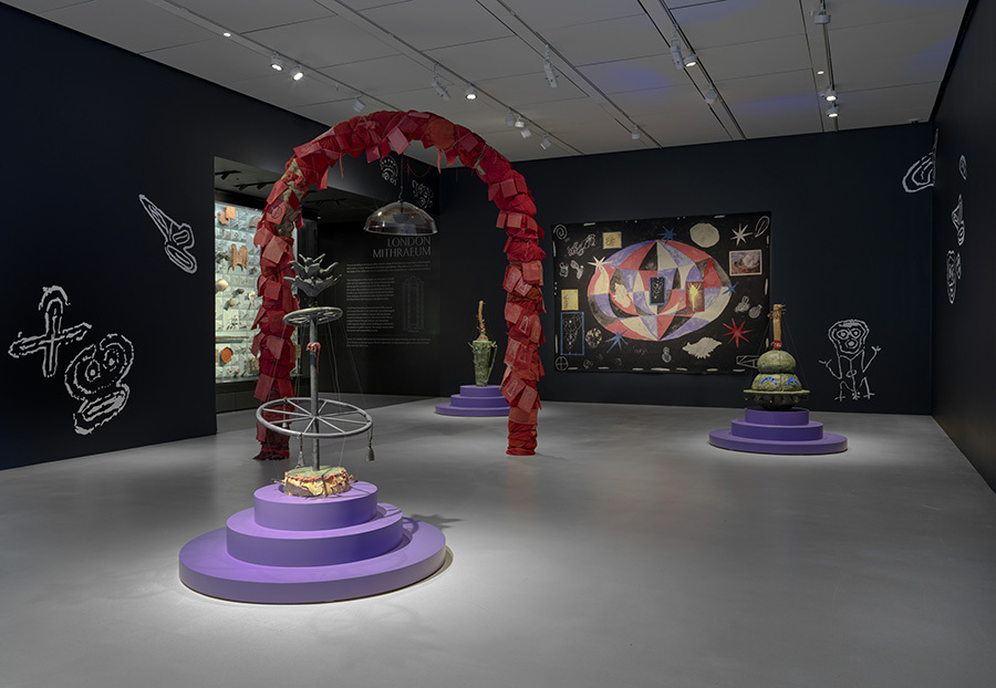 Exhibition space with colourful abstract symbols and structures