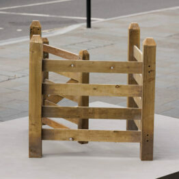 A two way gate used in fields called 'kissing gate'